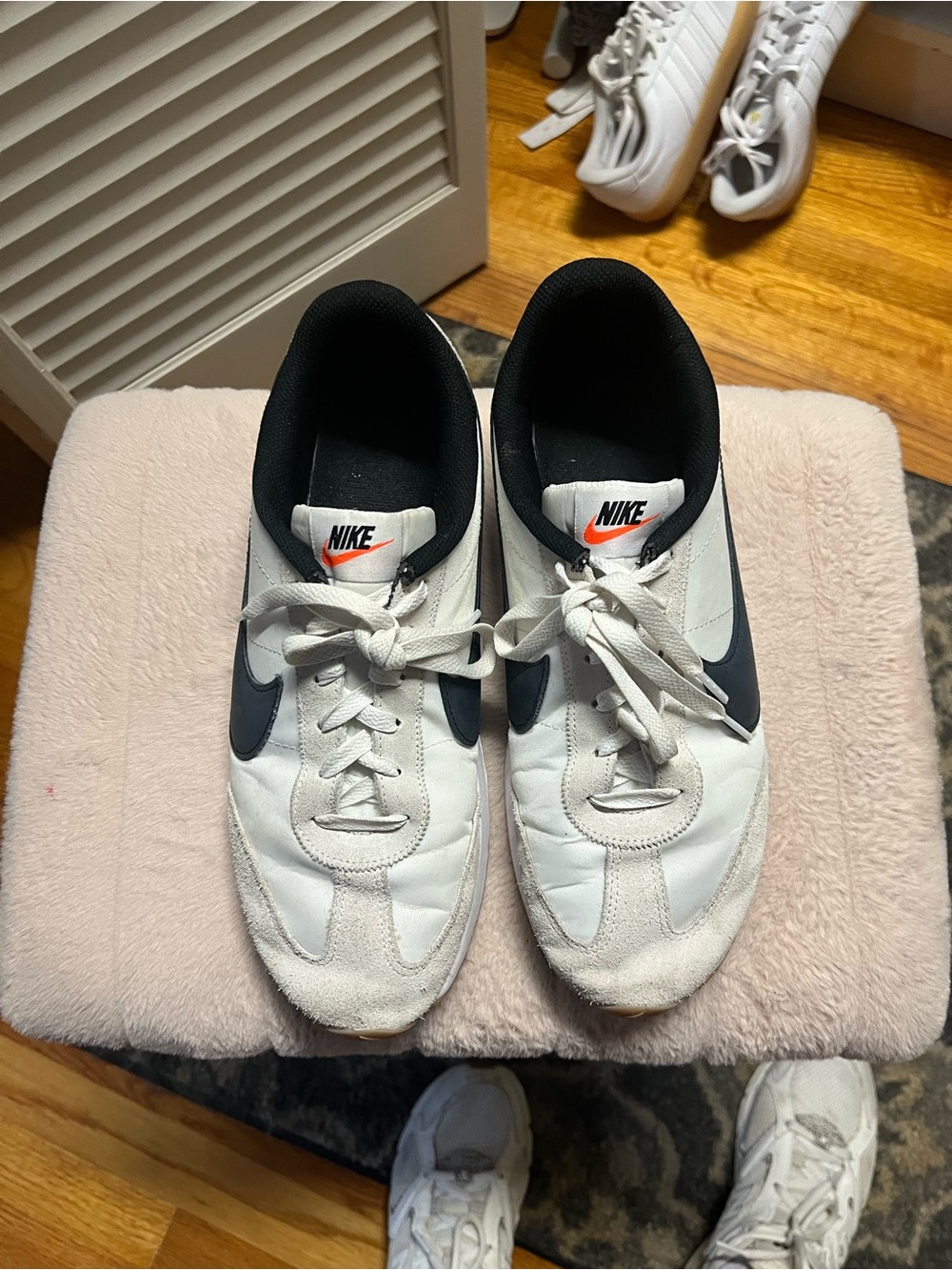 Nike Men’s White & Black Low-Profile Sneakers with Orange Logo